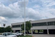 60-Foot Flag Pole Displays Custom Flag For ESAB In Denton, TX